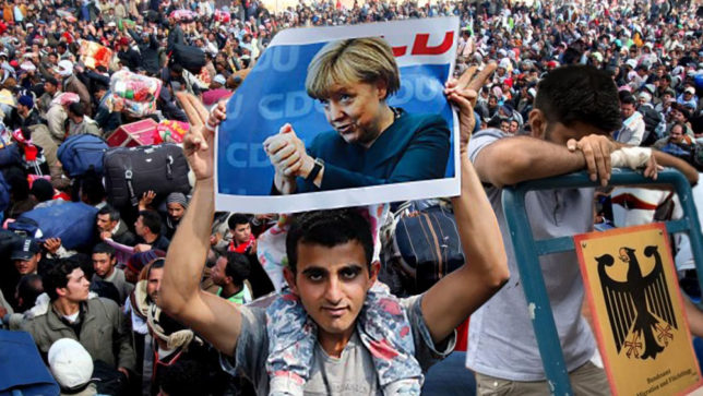 migranti, merkel